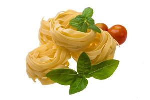 Tagliatelle with basil, tomato and mint photo