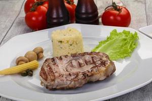 Grilled pork neck steak photo