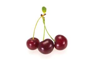 Sweet ripe cherry with leaves photo