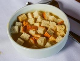 Soup with croutons photo