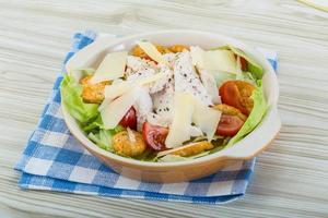 Caesar salad with chicken photo