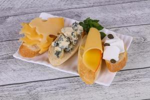 Bruschetta with various cheeses photo