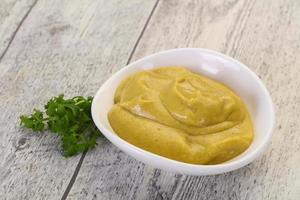 Mustard sauce in the bowl photo