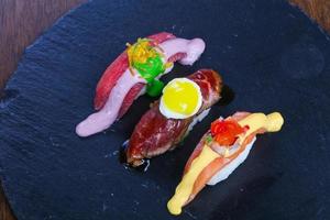 Sushi with tuna, salmon and beef photo