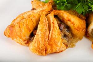 Pastry with meat photo