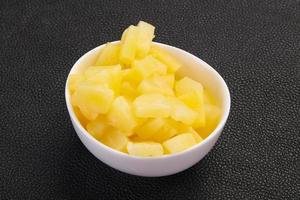 Marinated pineapple pieces photo