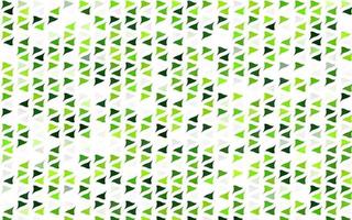 textura de vector verde claro en estilo triangular.