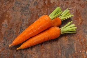 Three Young fresh ripe carrot photo