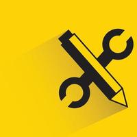 crossed wrench and pencil icon on yellow background vector