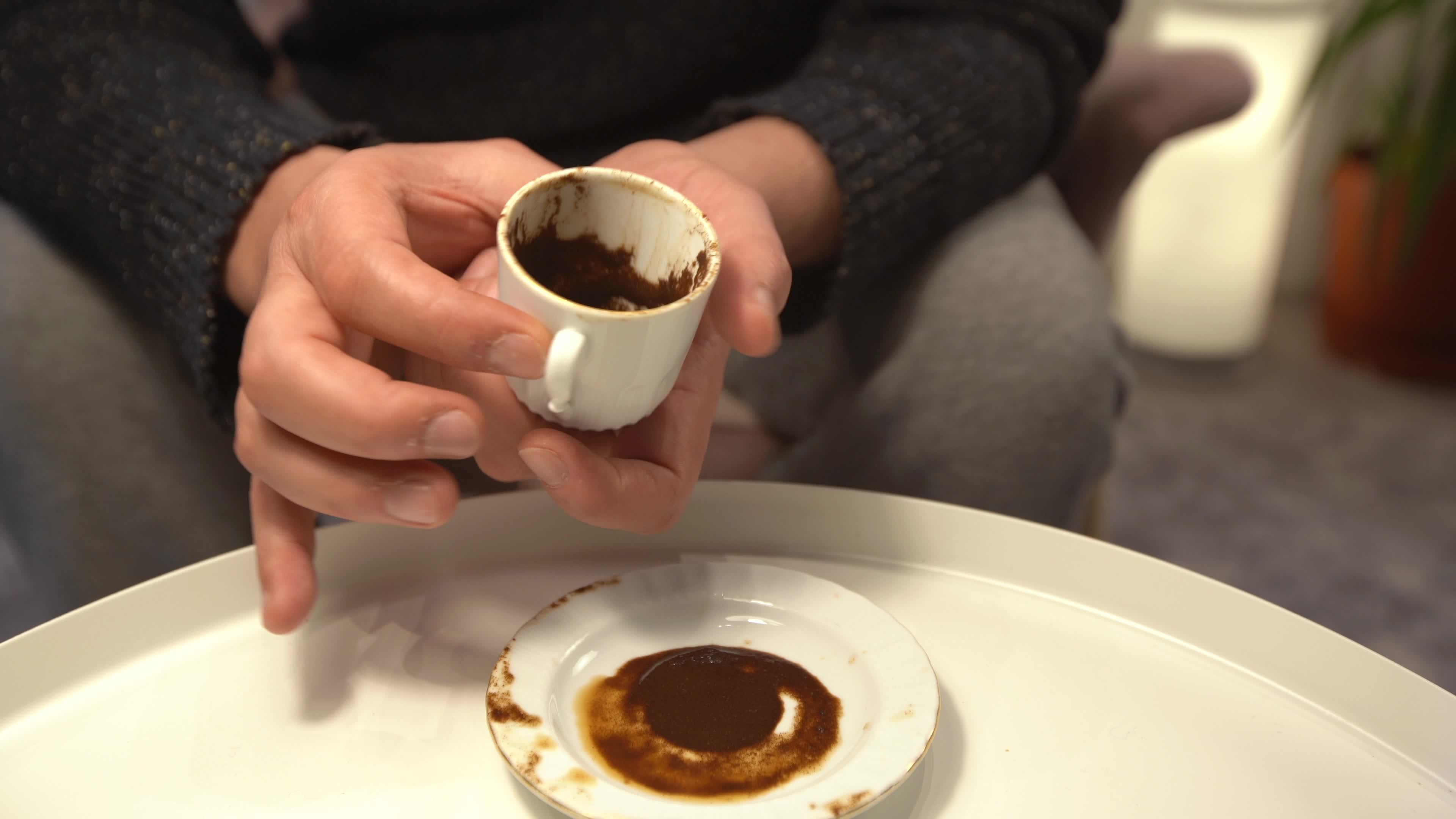 Fortune telling, Coffee cup. Fortune teller looking at coffee fortunes
