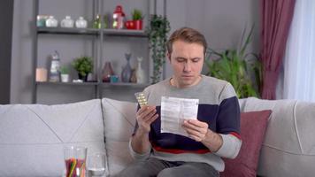 Review the prospectus and the drug. The patient examines the package insert and the drug. video
