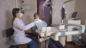 Mouth and dental health. The dentist is concerned with the oral and dental health of his patient. Checks the patient's teeth. video