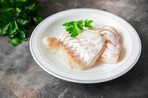 cod fish white skinless fillet fresh meal food snack on the table copy space food background photo
