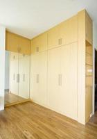 Modern style of wooden wardrobe with handles photo