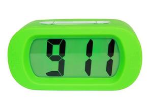 Green clock isolated on white background photo