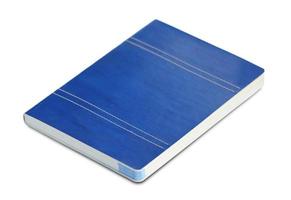 Blue notebook isolated on white photo