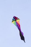 Colorful kite with blue sky background photo