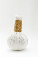 Natural Spa Ingredients herbal compress ball isolate on white background photo