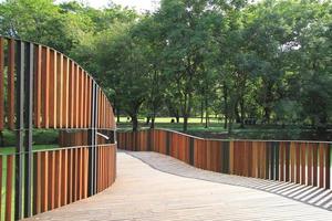 Wooden walkway in the park photo