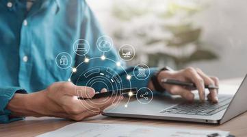 Man working with mobile phone showing cloud computing diagram in hand cloud technology data storage network and internet service concept photo