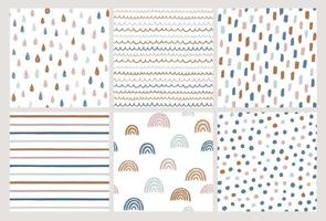 Set of hand drawn vector patterns in trendy colors. Doodles made with ink. Rainbow, stripes, dots, rain drops, brush strokes. Seamless geometric backgrounds.