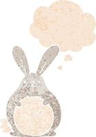 cartoon rabbit and thought bubble in retro textured style vector