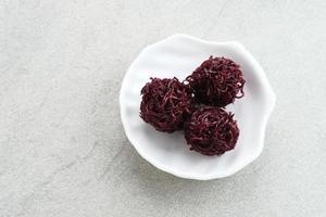 Grubi, Indonesian snack made from sweet potato with crispy texture and sweet taste. This grubi has a round shape. photo
