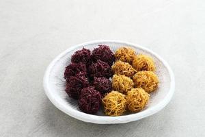 Grubi, Indonesian snack made from sweet potato with crispy texture and sweet taste. This grubi has a round shape. photo