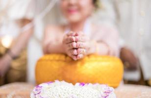 Traditional Thai wedding ceremony in local luxury vintage costume and wedding equipment. photo