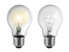 lighted bulb isolated on white background photo