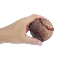 Baseball in hand on white background photo