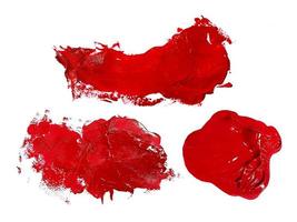 Red brush stroke isolated over white background photo