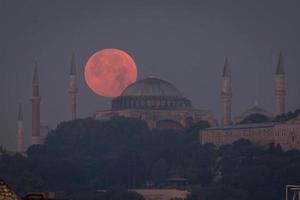 Moonset over Hagia Sophia, Istanbul, Turkey photo