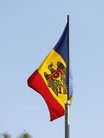 Moldova flag flying on flagpole photo