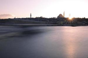 Suleymaniye Mosque and Golden Horn during Sunset in Istanbul, Turkey photo