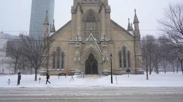 Urban church downtown in the winter snow video