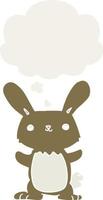 cute cartoon rabbit and thought bubble in retro style vector