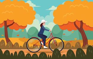 mujer montando bicicleta en temporada de otoño vector