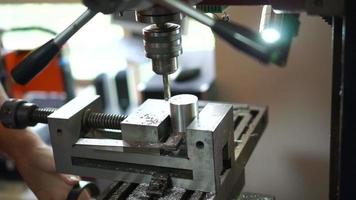 Milling machine smooths surfaces on aluminum cylinder. video