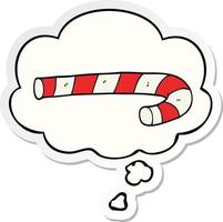 cartoon candy cane and thought bubble as a printed sticker vector