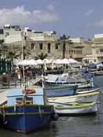 Marsaxlokk harbor on malta island photo