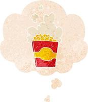 cartoon popcorn and thought bubble in retro textured style vector