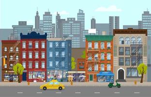 Vector illustration of Manhattan street with different retro houses with shops, taxi, scooter. City silhouette at the background. Cityscape in flat style.