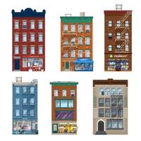 conjunto de vectores de diferentes edificios de la ciudad en estilo manhattan con tiendas, miradas, elementos de decoración. fachadas de tiendas en edificios de ladrillo vivo. farmacia, regalos y antigüedades, lavandería, cafetería, librería. plano.