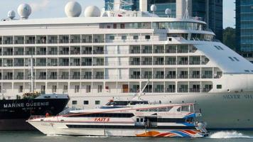 SINGAPORE NOVEMBER 24, 2018 - Batam Fast Ferry and Ocean Ship Silver Shadow in Singapore Cruise Centre Regional Ferry Terminal HarbourFront and the cable car from above going to the park Sentosa video