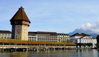 wooden Chapel Bridge and Tower in Lucerne photo