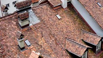 close up old town city house roof photo