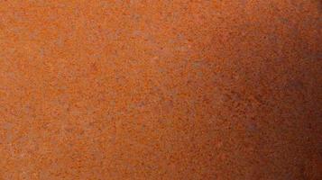 Abstract textures and natural gradient background of completely rusted iron surface photo