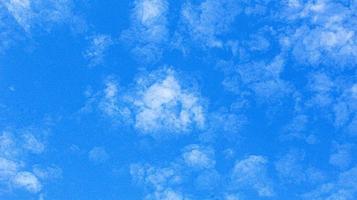 Empty space made of blue sky with clouds. Blue background for your design and products. Copy space for your text. photo