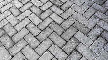 Floor motif of rectangular cement bricks for your design concept.  Geometric background pattern of rough cement floor. Paving block motif. photo